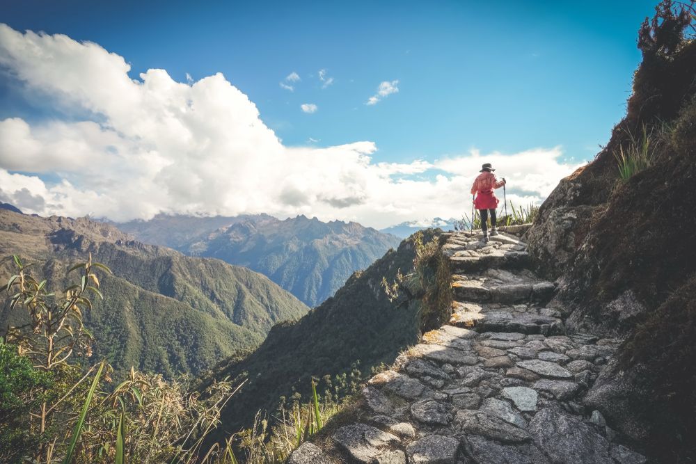 Lady walking up the inca trail